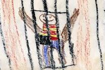 Child climbing a rope or ladder between buildings.