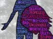 Silhouette filled with negative words reflecting self-doubt and low self-esteem.
