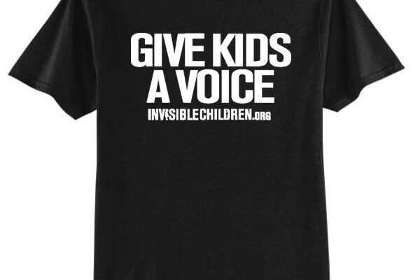 bdcc5443-f160-4644-ab3b-bd2eb9995e80 Black T-shirt with bold white text promoting kids' voices.