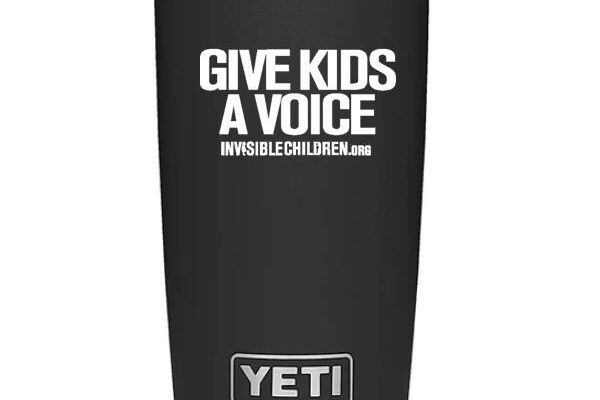 Black YETI tumbler with 'Give Kids A Voice' slogan printed.